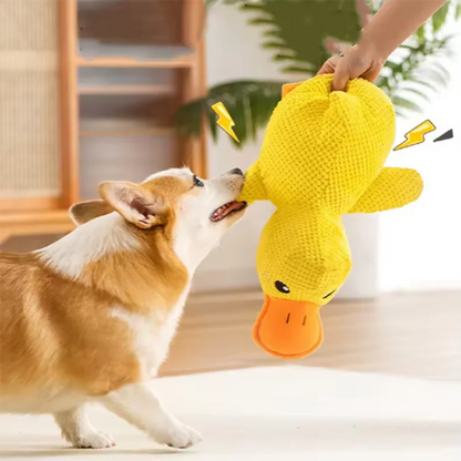 Dog sleeping with a dog hug duck toys